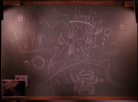Owl Cave petroglyph on blackboard